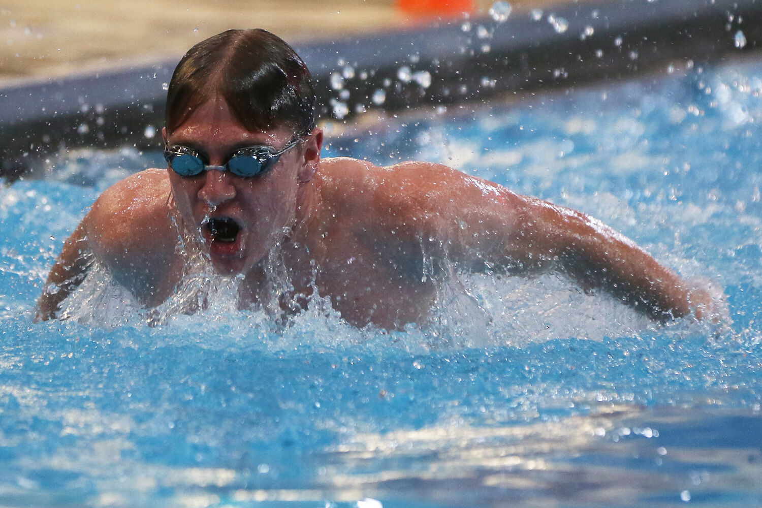 Max Kessler takes a breath as he surfaces
